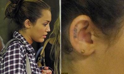 Miley: Tatuaje en la oreja...